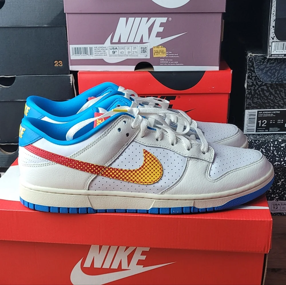 Nike White and Blue Sneakers with Orange Swoosh
